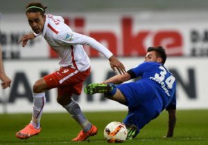 26 Feb 2016, Paderborn, Rhineland, Germany --- Leipzig's Yussuf Poulsen (l) and Paderborn's Robin Krausse in action during the 2nd Bundesliga soccer match between SC Paderborn 07 and RB Leipzig at Benteler-Arena in Paderborn, Germany, 26 February 2016. Photo: Jonas Guettler/dpa (ATTENTION: Due to the accreditation guidelines, the DFL only permits the publication and utilisation of up to 15 pictures per match on the internet and in online media during the match.) --- Image by © Jonas Güttler/dpa/Corbis